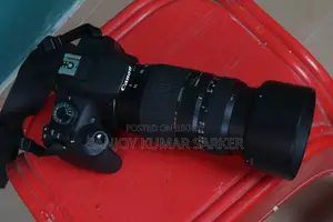 ক্যানন ১২০০ডি ক্যামেরা কিট লেন্স ১৮-৫৫, ট্যামরন জুম লেন্স ৭০-৩০০ অথবা ব্যাগ সহ