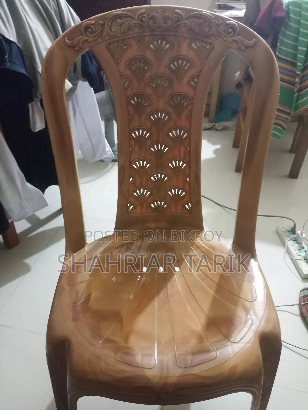 Wooden table, plastic chair