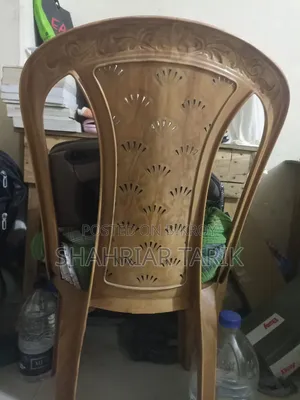 Wooden table, plastic chair