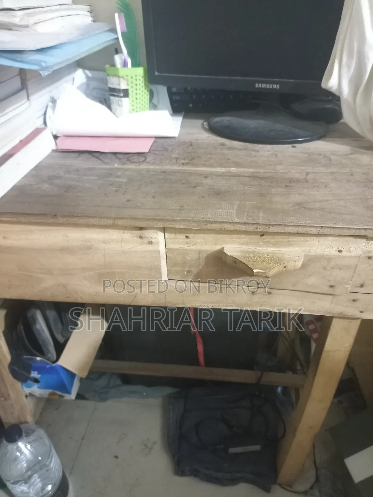 Wooden table, plastic chair
