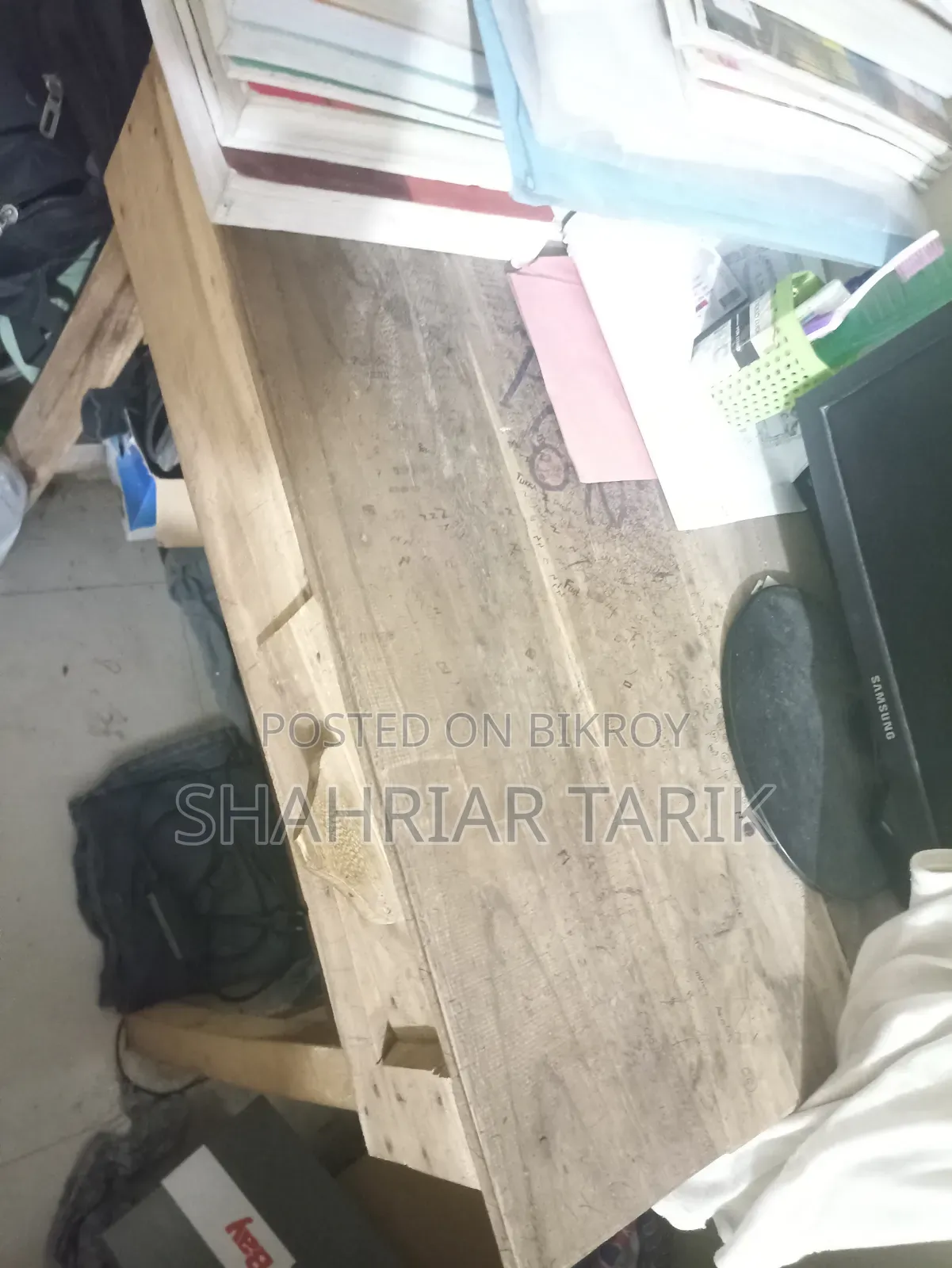 Wooden table, plastic chair