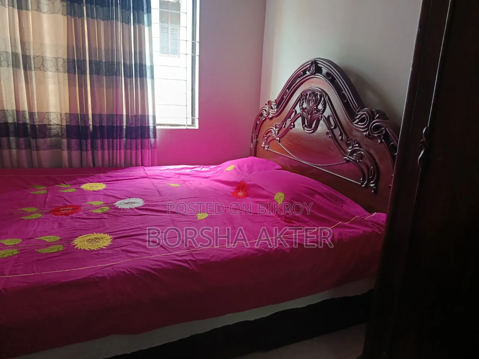 কাঠের বিছানা