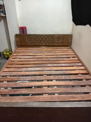 A 5 feet by 7 feet bed for sale.