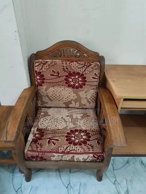 সেগুন কাঠের সোফা।