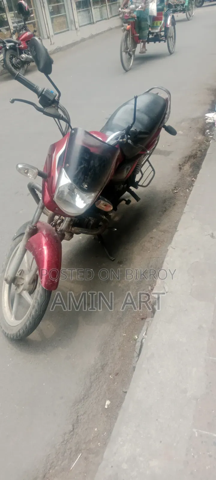বাজাজ প্লাটিনা ১০০ ২০১৪ লাল