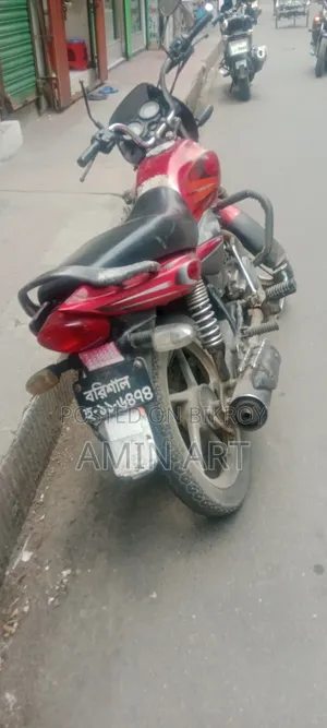 বাজাজ প্লাটিনা ১০০ ২০১৪ লাল