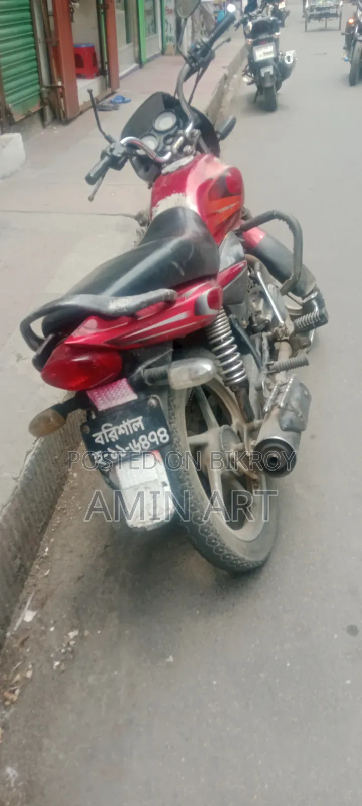 বাজাজ প্লাটিনা ১০০ ২০১৪ লাল