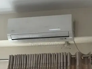 Media 1 Ton Non-Inverter AC