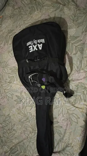 Bought it yesterday, cannot play, so selling it with all guitar accessories