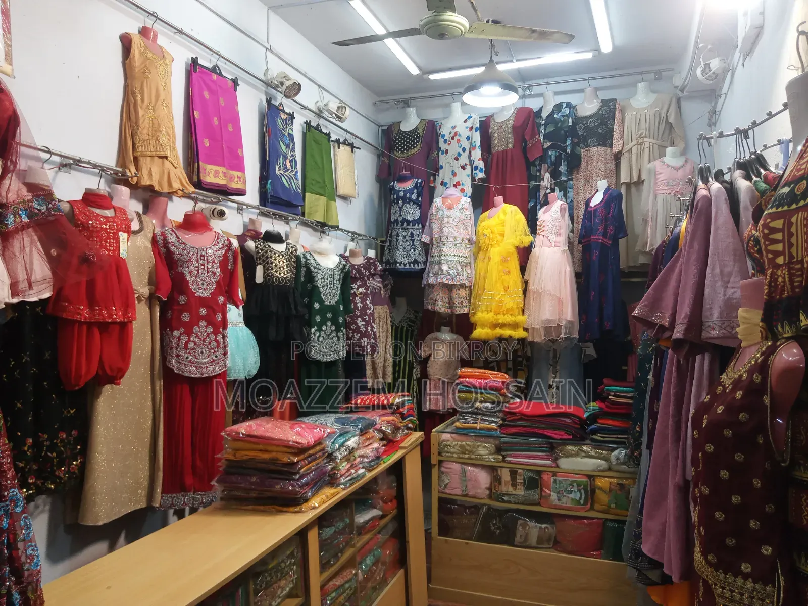 All items of the clothing store including clothes.