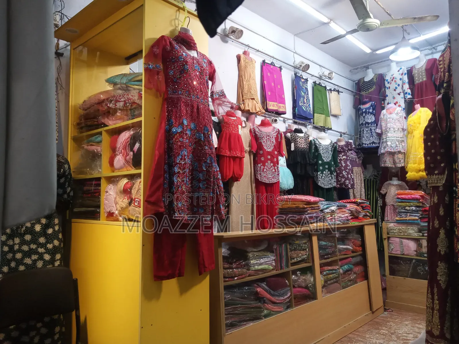 All items of the clothing store including clothes.