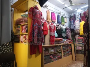 All items of the clothing store including clothes.