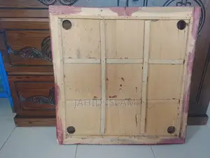 25-inch almost new carrom board with strikers to be sold