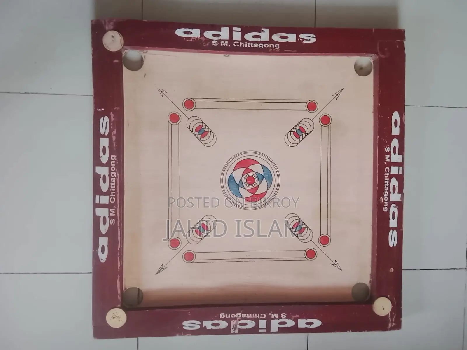 ২৫ ইঞ্চি প্রায় নতুন ক্যারাম বোর্ড গুটিসহ বিক্রি হবে