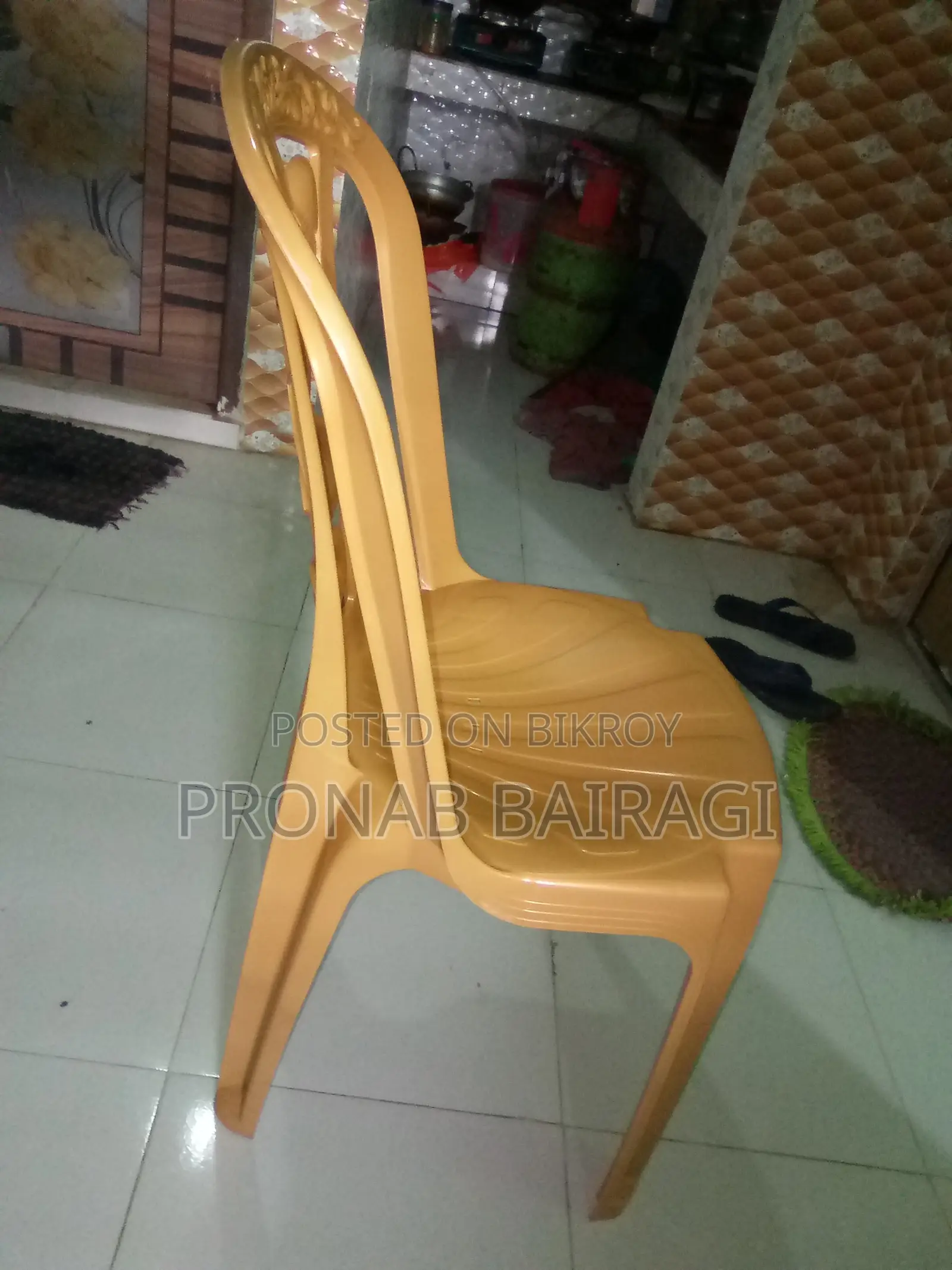 Wooden table and plastic chair purchased on 30-05-2026.