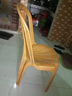 Wooden table and plastic chair purchased on 30-05-2026.