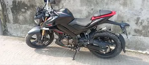 কিউজে মোটর মনস্টার এসআরকে ১৮০ ২০২৬ ব্ল্যাক