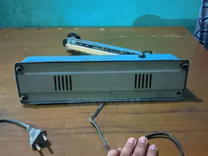 প্যাকেট ছিলার মেশিন।