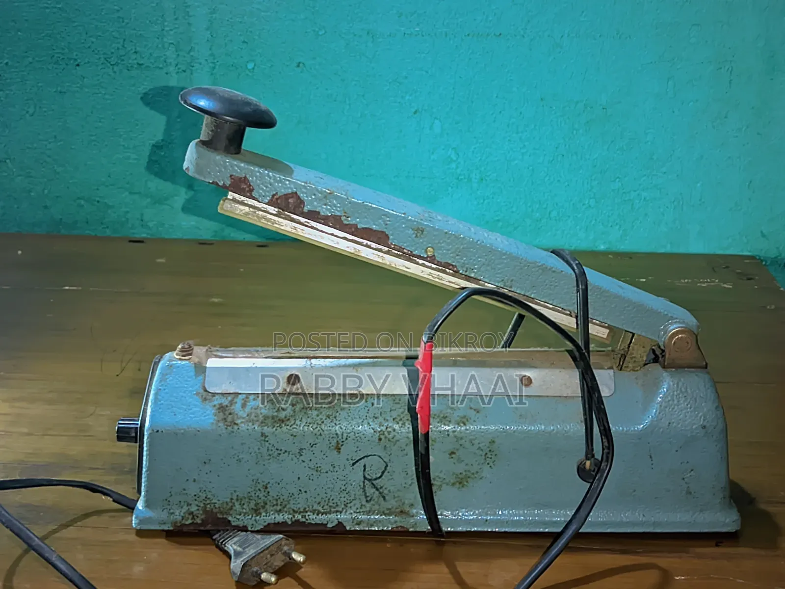 প্যাকেট ছিলার মেশিন।