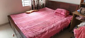 1 Wooden Bed