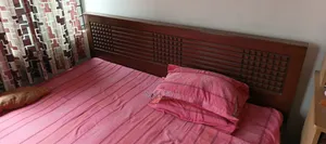 1 Wooden Bed