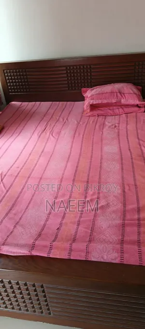 1 Wooden Bed