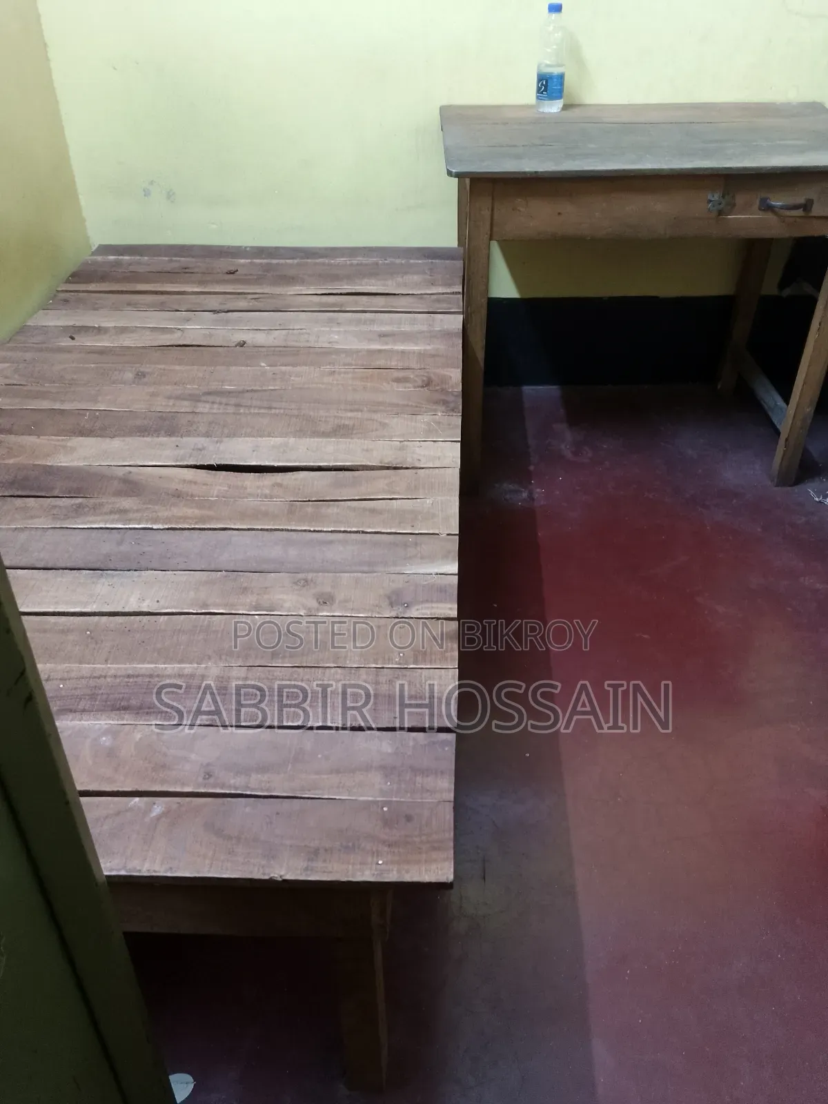 Single wooden cot and wooden table