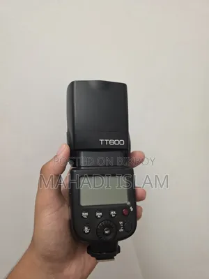 Fujifilm Lens And Godox Flashlight
