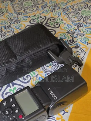 Fujifilm Lens And Godox Flashlight