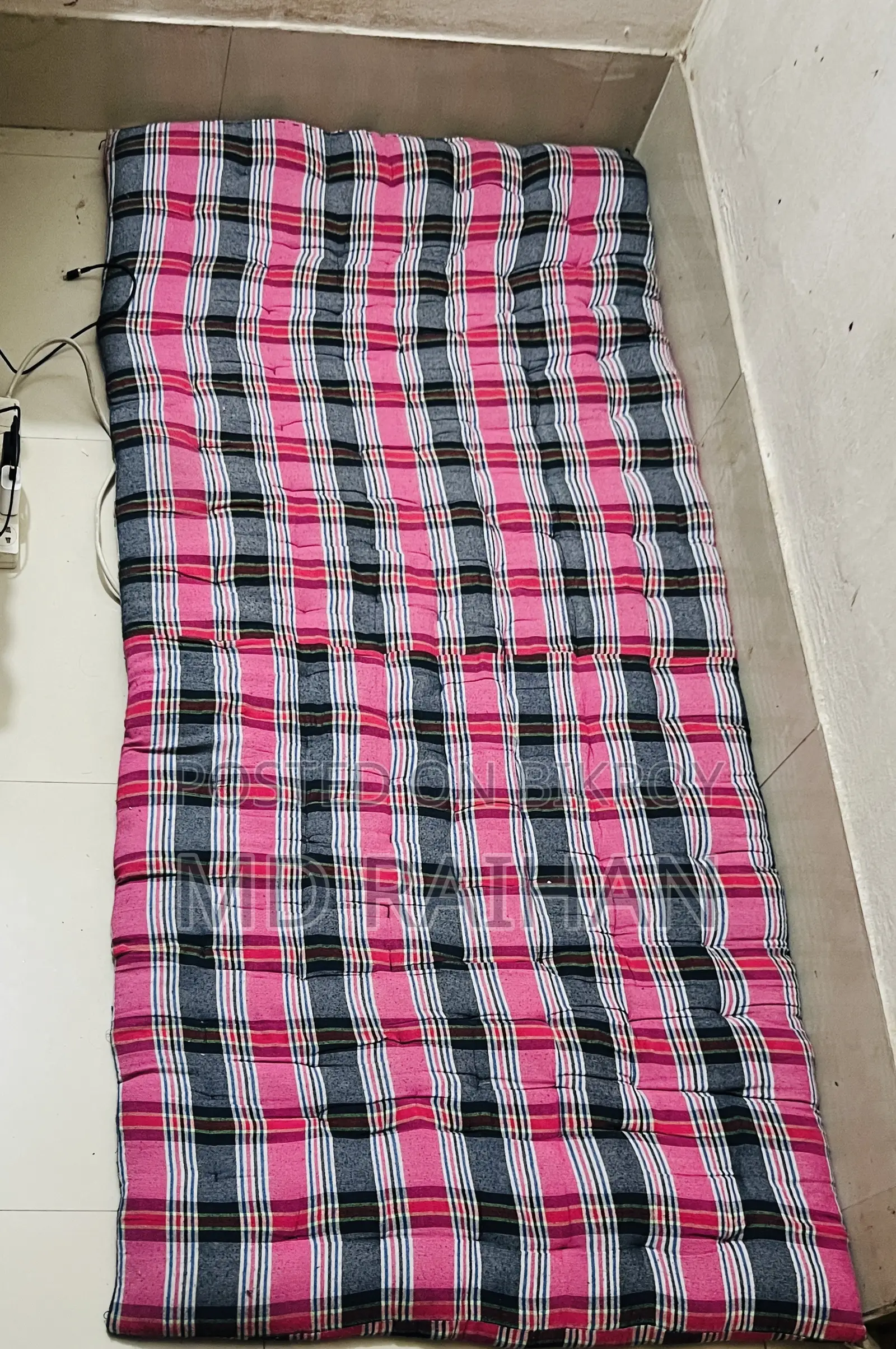 2 Used Single Bed Mattresses and 1 Bolster