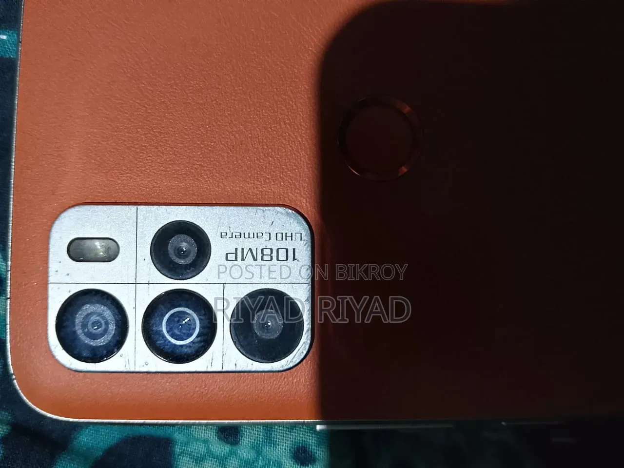 New Helio 128 GB Orange