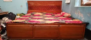 A good quality mahogany wood bed used for 5-6 months