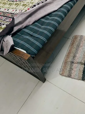 Series wood bed with mattress 5 feet wide 7 feet long