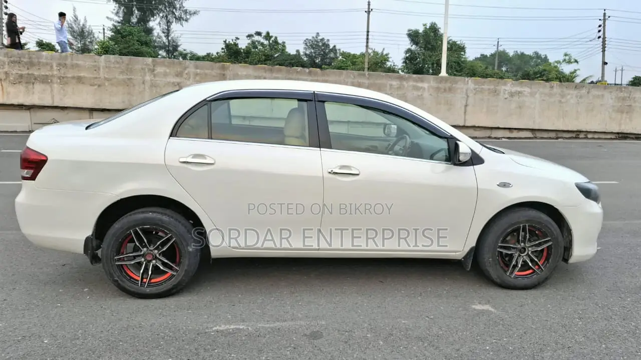 Toyota Axio 2011 Pearl