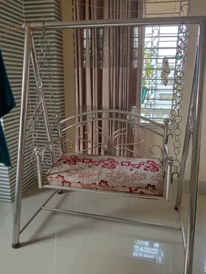 এস এস দোলনা