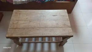 Center table, top with full wood shade, bottom made of teak wood