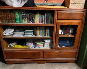 A beautiful and sturdy wooden showcase for sale due to urgent need.