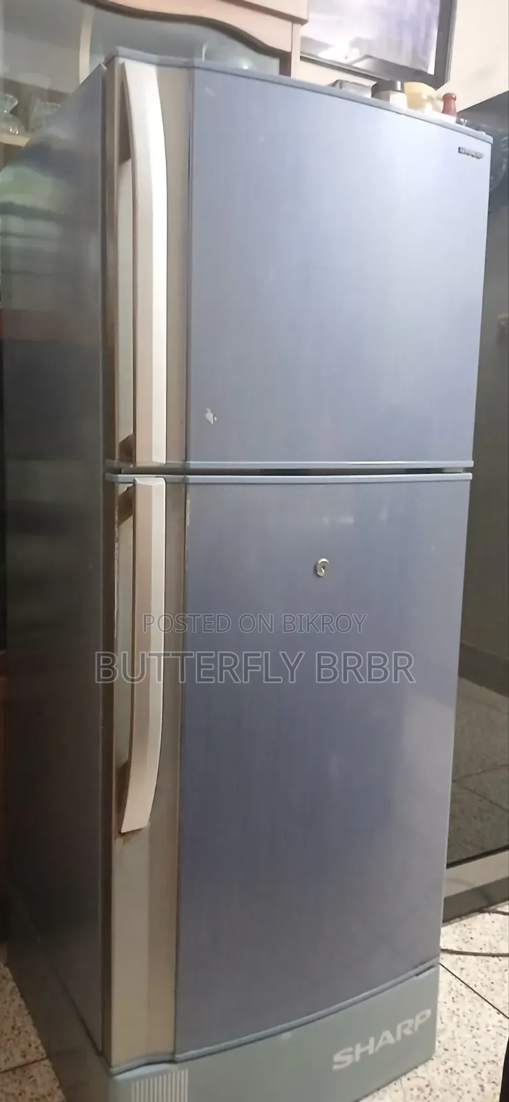 An old working fridge of Sharp brand for sale