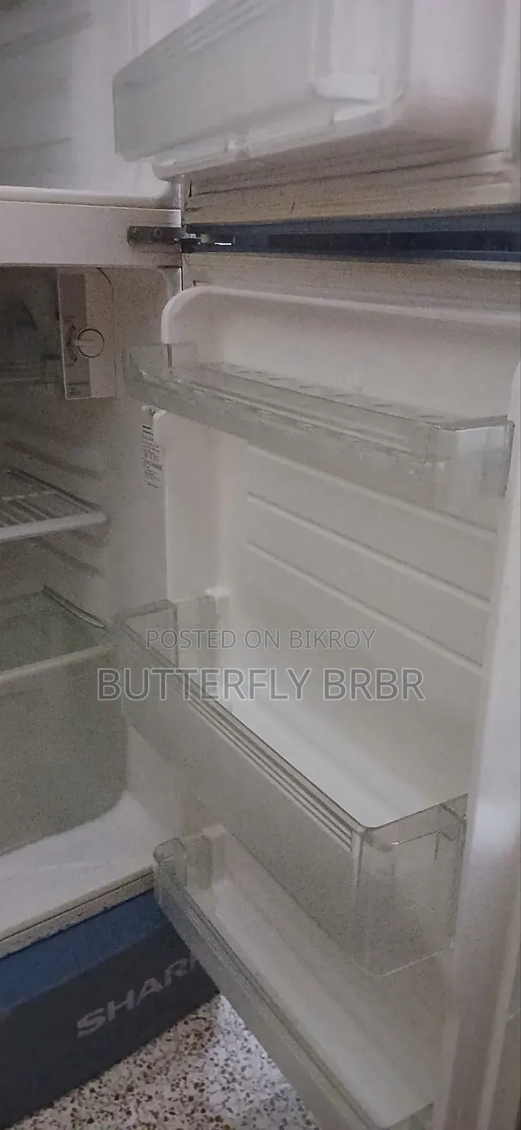 An old working fridge of Sharp brand for sale