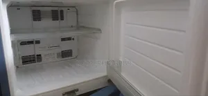 An old working fridge of Sharp brand for sale