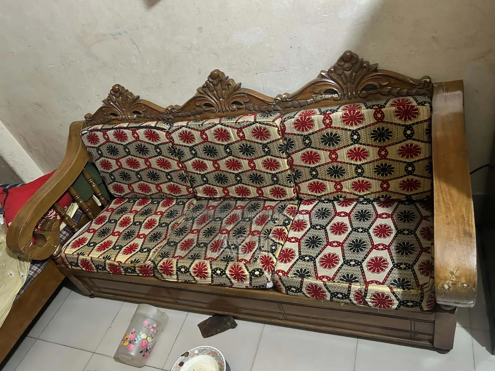 A set of teak wood sofa for sale.
