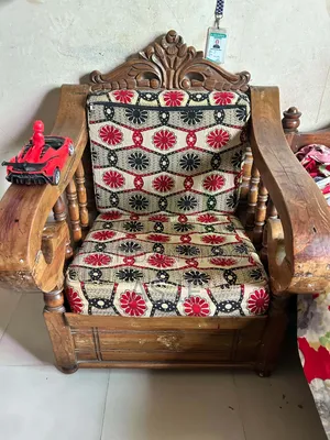 A set of teak wood sofa for sale.