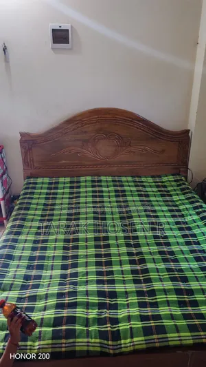 Bed 6 feet by 7 feet including mattress