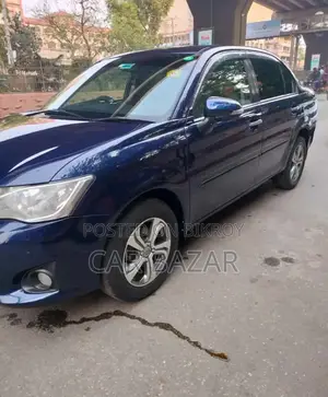টয়োটা এক্সিও ২০১৩ নীল