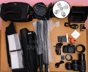 Canon 77d Body, Lens, Softbox, Light, everything new and in box condition.