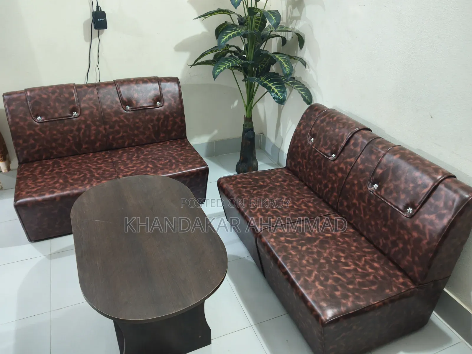 Four-seater sofa with tea table for sale