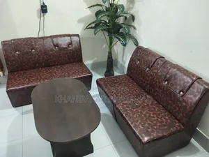 Four-seater sofa with tea table for sale