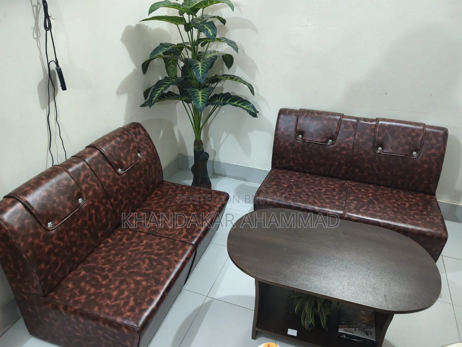 Four-seater sofa with tea table for sale