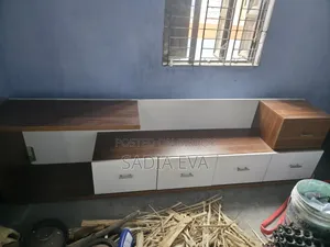 TV cabinet for sale. Length 96 inches and width 25 inches.