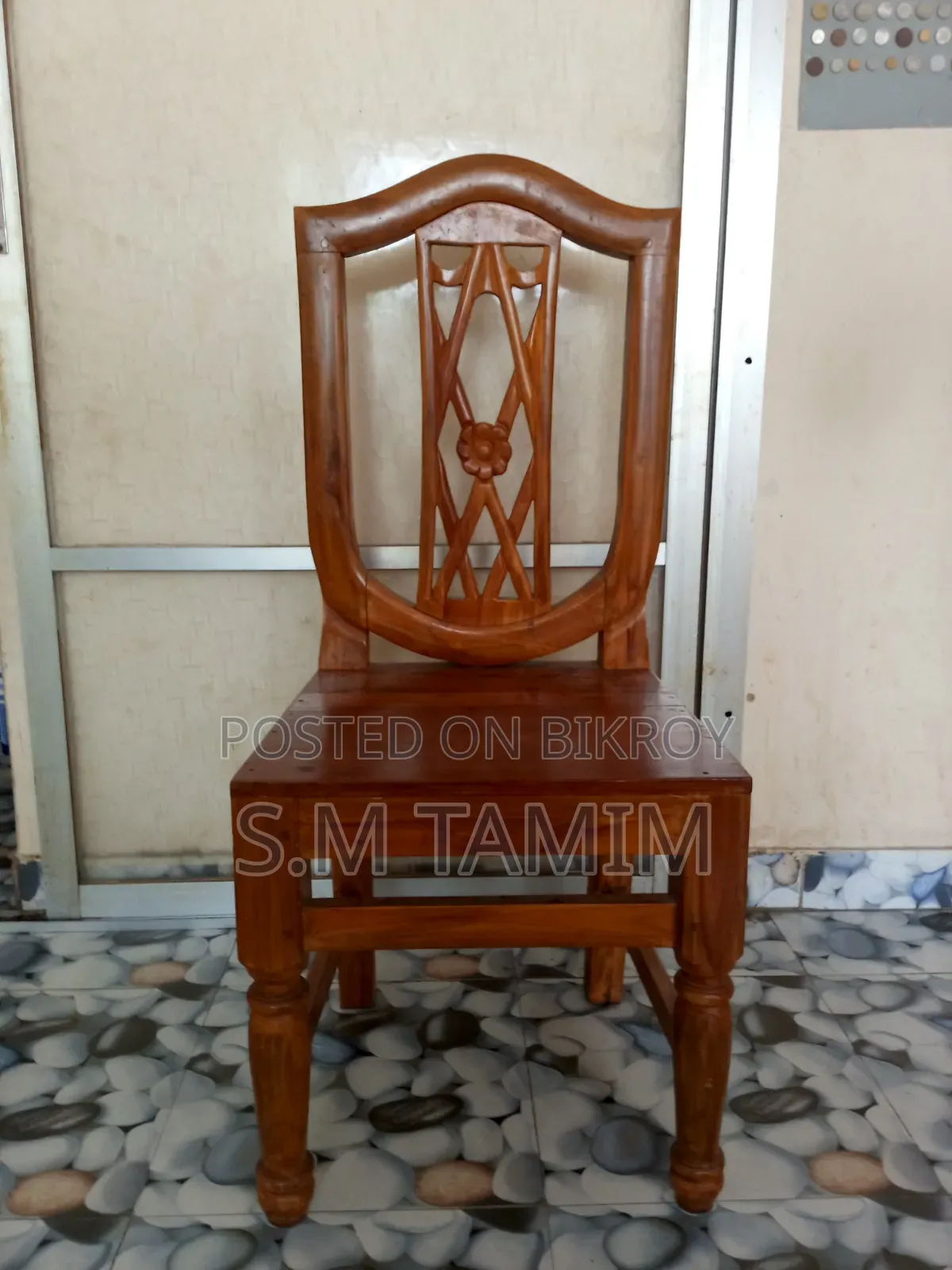 A good teak wood chair for sale
